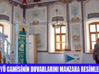 ASIRLIK CAMİ DUVARINDA RESİMLER VAR